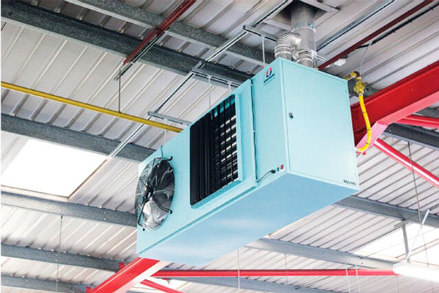 A heating unit in a large commercial warehouse