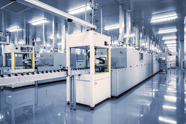 A large room full of machinery with fitted air conditioning and ventilation systems